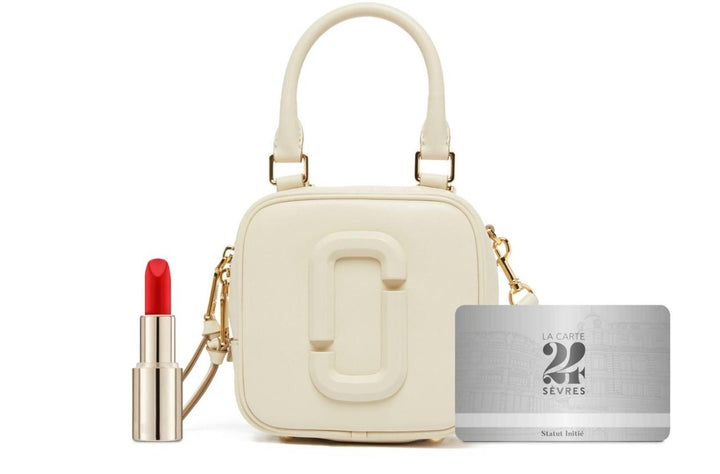 THE COVERED  MARC J CUBE